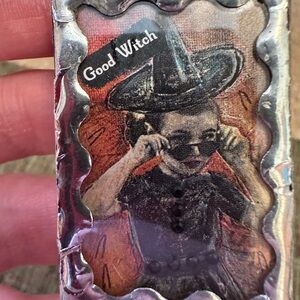 Good Witch/ Bad Witch Pendant with Silver Soldered Frame.  Reversible.